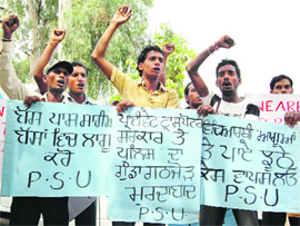 Activists of the PSU stage a protest in Amritsar on Wednesday.