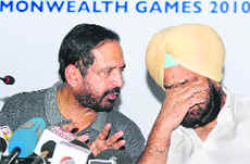 IOA president Suresh Kalmadi and Randhir Singh, vice chairman of Commonwelath Games organising committee address a press conference on Wednesday.