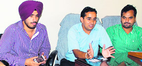 Amit Bhatia, president of Student Council, PU, (extreme right) and others address a press conference at Student Centre.