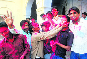 Students of DAV College celebrate the victory of their candidates in the student council elections in Dehradun on Thursday.