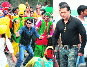 Shiamak Davar dances to a Punjabi tune and Salman Khan (right) walks towards the venue of Dance Premiere League in Gurgaon.