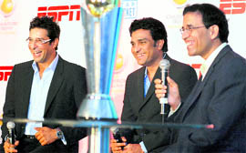 Former Pakistan captain Wasim Akram (L), former India Test player Sanjay Manjrekar and ESPN Star Sports commentator Harsha Bhogle (R) at a press conference in New Delhi on Thursday.