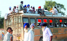 The overloading of buses is quite common in Amritsar.
