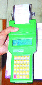 A hand-operated bill printing machine.