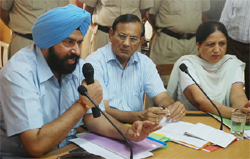 Mayor Baljeet Singh Birbehman tries to pacify the councillors at the BMC meeting on Friday.