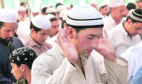 Muslims offer namaz on the last Friday of Ramzan in Jammu. 
