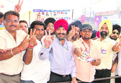 DS Chawla flashes victory sign after winning elections.
