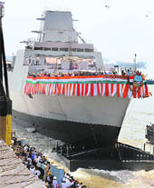 This handout picture released on Friday by the Press Information Bureau shows the launch of the INS Kochi at the Mazgon Dockyard in Mumbai. 