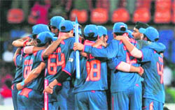 Indian team in a huddle after winning the finals of the three-nation Compaq Cup in Sri Lanka