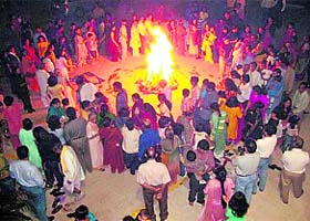 People burn demons as part of the Khatarwa festival of Kumaon