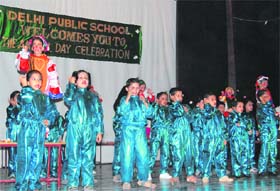 Kids at Delhi Public School, Manali, presenting a cultural item at their annual function