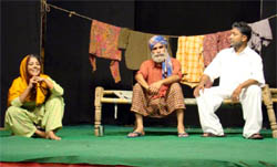 A scene from a Punjabi drama being played during the Baba Farid mela in Faridkot.