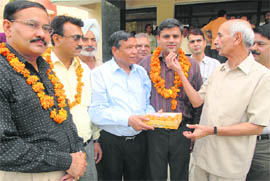The elected members being congratulated after winning the Bar Council of Punjab and Haryana elections at the Law Bhawan in Chandigarh on Sunday.