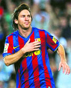 Barcelonas Lionel Messi celebrates after scoring his second goal against Atletico Madrid during their Spanish First Division soccer match at Camp Nou stadium in Barcelona on Friday.