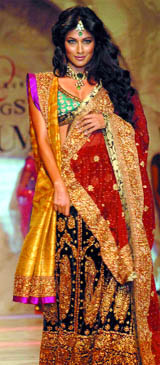 Bollywood actress Chitrangadha Singh wears a wedding dress of Ritu Kumar at a fashion show in New Delhi on Monday.