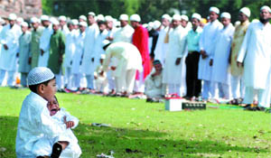Muslim devotees gather to offer namaz on the occasion of Id in Gurgaon on Monday.