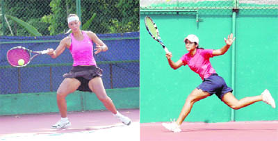 Jasmin Steinherr (L) and Ashvarya Shrivastava in action at the ITF Womens Tennis Tournament in Dehradun on Tuesday.