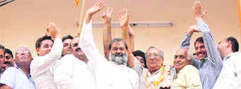 Anil Vij with supporters outside the BJP office in Ambala on Tuesday.
