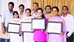 Students of Panjab University Regional Centre in jubilant mood after winning the first position in legal and presentation skills.