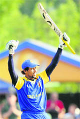 Sri Lankas Tillakaratne Dilshan celebrates after scoring a century on Tuesday.