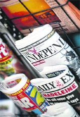 A copy of The Independent newspaper is seen on a stand in London