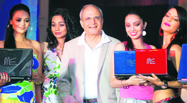 Chairman & CEO HCL Infosystem, Ajay Chowdhry with models at the launch of new HCL ME range of laptops in New Delhi 