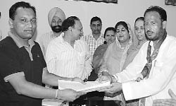 INLD candidate Pardeep Chaudhary files his nomination papers at SDM office in Kalka.