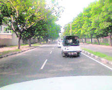 A police Gypsy, without the registration plate, part of a VIP cavalcade on the road separating Sectors 36 and 37, Chandigarh, on Thursday.