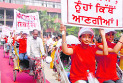 Students of Government College for Girls, Sector 42, take part in the rally in Chandigarh on Thursday. 