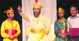Artistes stage play Taj Mahal Ka Tender at Tagore Theatre in Chandigarh on Thursday.