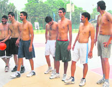 The bare-chested players during a basketball match at Panjab University, Chandigarh, on Thursday.