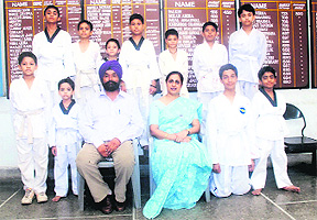 Students of BVM Senior Secondary School, Udham Singh Nagar, who won medals.