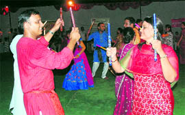 A couple grooves to dandiya dhuns at Gujarat Bhavan in Sector 24, Chandigarh