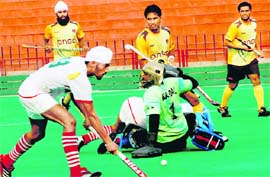 A match in progress at the Hockey Stadium in Chandigarh on Friday.