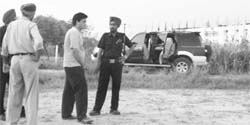 An abandoned Ford Endeavour in the fields outside Chandigarh Group of Colleges, Landran.
