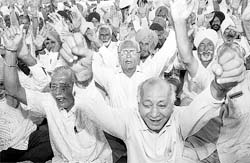 Members of the Pensioners Association of Punjab State Coop. Agriculture Developments Bank Ltd, protest in support of thier demands in Sector 25 on Friday.