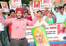 Members of INSO take part in a rally in connection with the birth anniversary of Bhagat Singh at Panjab University, Chandigarh, on Friday.