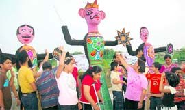 Students of the Society for Rehabilitation of Mentally Challenged celebrate Dasehra in Chandigarh on Friday.