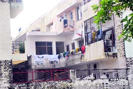 An extended balcony of an HIG flat in Sector 38 D (West).
