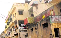 Illegal constructions in Sector-45 LIG flats.