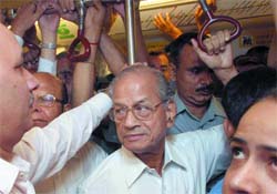 Metro chief E.Sreedharan travels on the new broad gauge train in New Delhi on Friday. 