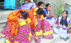 Students, tired of waiting for Chief Minister Ramesh Pokhriyal Nishank, at a function in Dehradun 