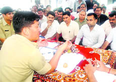 Haridwar SSP Sanjay Gunjiyal directs jewellery traders and owners on security measures in Haridwar.