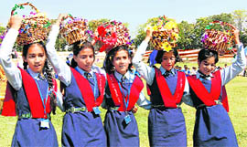 Girls perform during the inauguration of the 55th National School Cricket Championship in Srinagar on Friday.