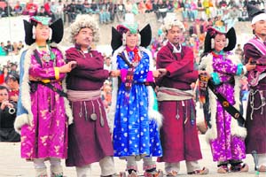 Artistes perform the folk dance of the Nimoo village