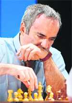 Former chess world champion Garry Kasparov makes a move in his match against Anatoly Karpov in Valencia