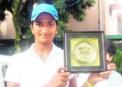 Poojashree Venkatesha who won the singles title at the ITF Tennis Tournament in Dehradun on Saturday.