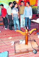 Furniture lies ransacked after JKLF and AAC activists disrupted the Id Milan function organised by journalist Shabnam Qayoom (inset) in Sirinagar on Saturday.