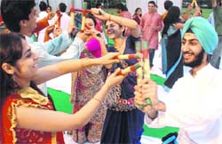 Youth of the Yesplus Club participate in dandiya at Sikhya School in Chandigarh on Sunday.