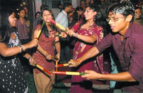 Youngsters enjoy dandiya dance at Hansdhwani theatre in New Delhi